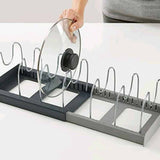 Optimized Product Title: **Verstellbarer Pfannen- und Deckelhalter – Platzsparend für Schubladen & Schränke – Ideal für die Küche** 

This title includes relevant keywords while emphasizing the product's features and benefits, making it more appealing for