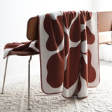 Enhanced Product Title: "Luxurious Jacquard Throw Blanket - Soft, Cozy, and Stylish Home Decor" 

This title includes keywords that potential customers might search for, while also highlighting the product's features and benefits.