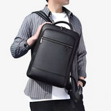 Men's Leather Laptop Backpack – USB Charging Port, 15.6-Inch Sleeve & PU Leather