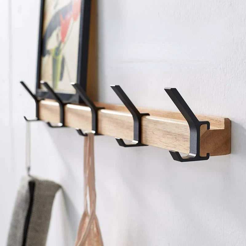 Enhanced Product Title: "Wandgarderobe mit 5 Doppelhaken – Stilvolle Holz- und Aluminium-Kombination für Flur und Eingangsbereich" 

This title includes keywords that enhance search visibility while providing a clearer description of the product's feature