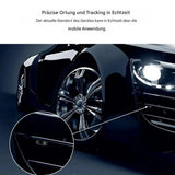 Black car with shiny rims, close-up, precise real-time location and tracking.