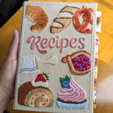 Optimized Product Title: **Handgefertigtes Rezeptbuch mit Spritzwassergeschützten Seiten – Bestickter Einband für Langlebigkeit und Stil** 

This title includes relevant keywords while enhancing clarity and appeal for potential buyers.
