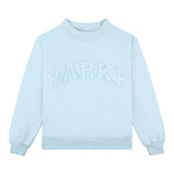 Enhanced Product Title: "Varsity Mockneck Sweater - Ice Blue - Stylish & Comfortable Unisex Fashion" 

This title includes relevant keywords while providing more context about the product, which can help improve visibility and appeal in Google Shopping se