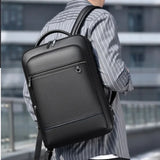 Men's Leather Laptop Backpack – USB Charging Port, 15.6-Inch Sleeve & PU Leather