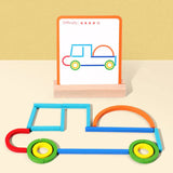 Optimized Product Title: "Holz-Stäbchen & Ringe Baukasten mit Aufgabenkarten - Kreatives Lernspielzeug für Kinder, Fördert Feinmotorik und Kreativität" 

This title includes relevant keywords while clearly describing the product's purpose and benefits, ma