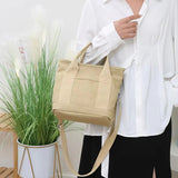 Optimized Product Title: "Japanisch Inspirierte Canvas-Tragetasche – Leicht, Langlebig & Mit Praktischen Innenfächern für Alltag & Reisen" 

This title includes relevant keywords while maintaining clarity and appeal for potential buyers.