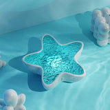 Ocean Wave Star Projector – 7 Colors, Adjustable Brightness & 1200mAh Rechargeable