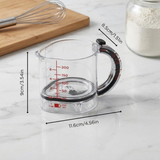 Adjustable Measuring Cup – Built-In Scraper, Non-Slip Base & Ergonomic Grip