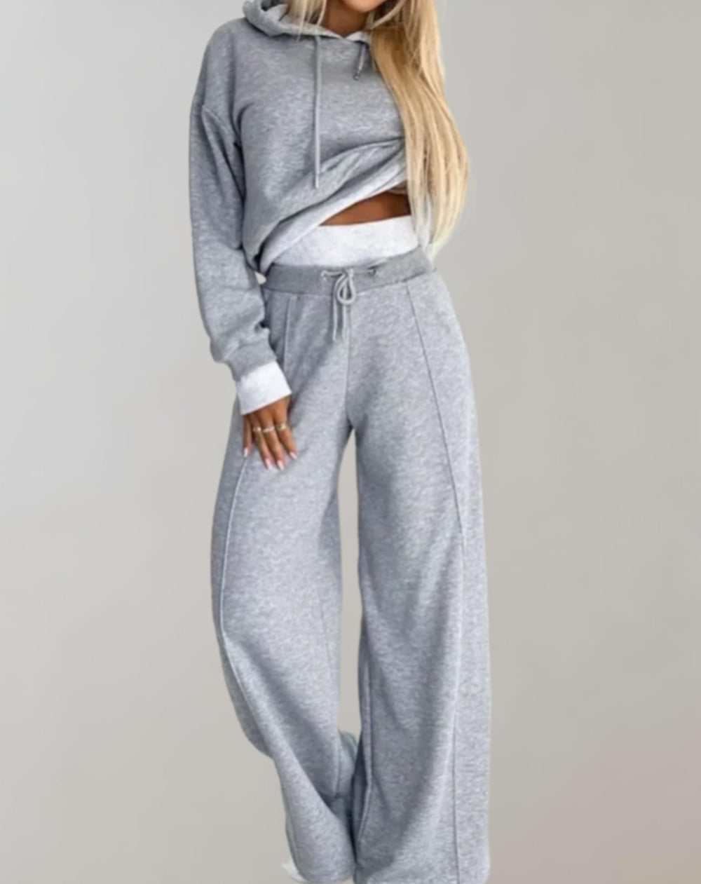 Grey women's sweatshirt and jogger pants set, comfortable, casual, loungewear.