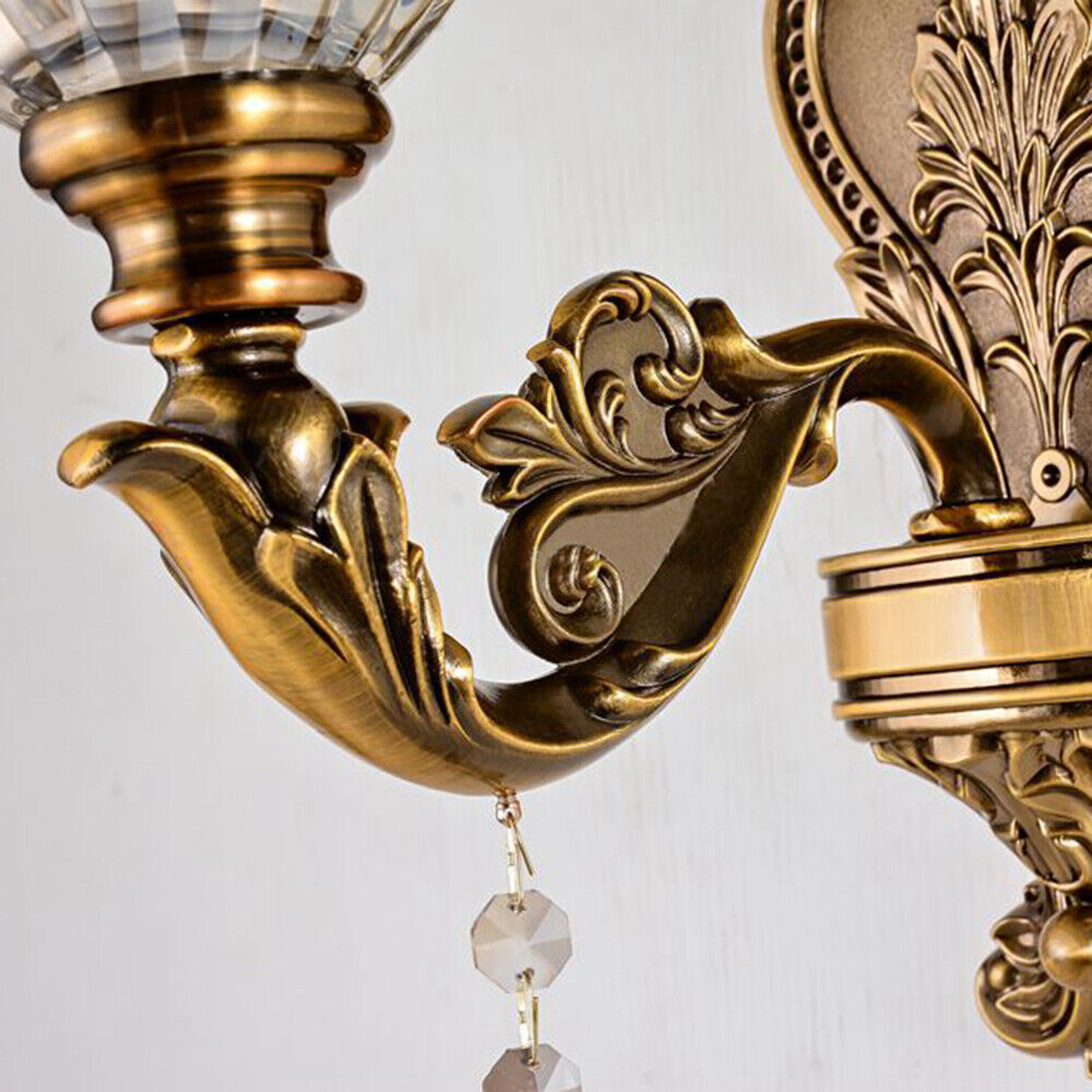 Classic gold vintage wall light with crystal accents, decorative wall lighting.