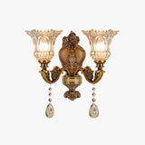 Vintage gold wall light with crystal accents, classic design, double arm, decorative.