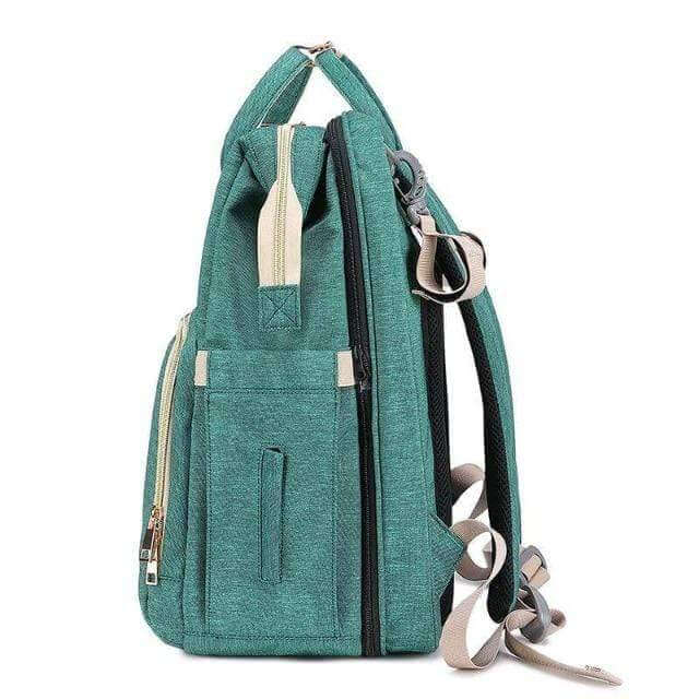 Enhanced Product Title:  
"Convertible Baby Diaper Backpack with Foldable Bassinet | Waterproof Multi-Pocket Design for Ultimate Convenience"  

This title is optimized for clarity and includes relevant keywords that potential customers might search for,
