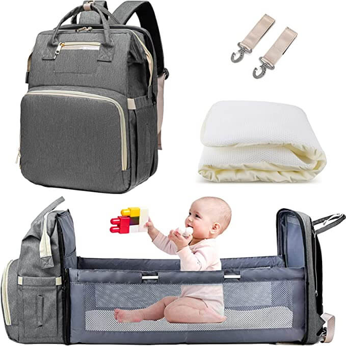 Enhanced Product Title:  
"Convertible Baby Diaper Backpack with Foldable Bassinet | Waterproof Multi-Pocket Design for Ultimate Convenience"  

This title is optimized for clarity and includes relevant keywords that potential customers might search for,