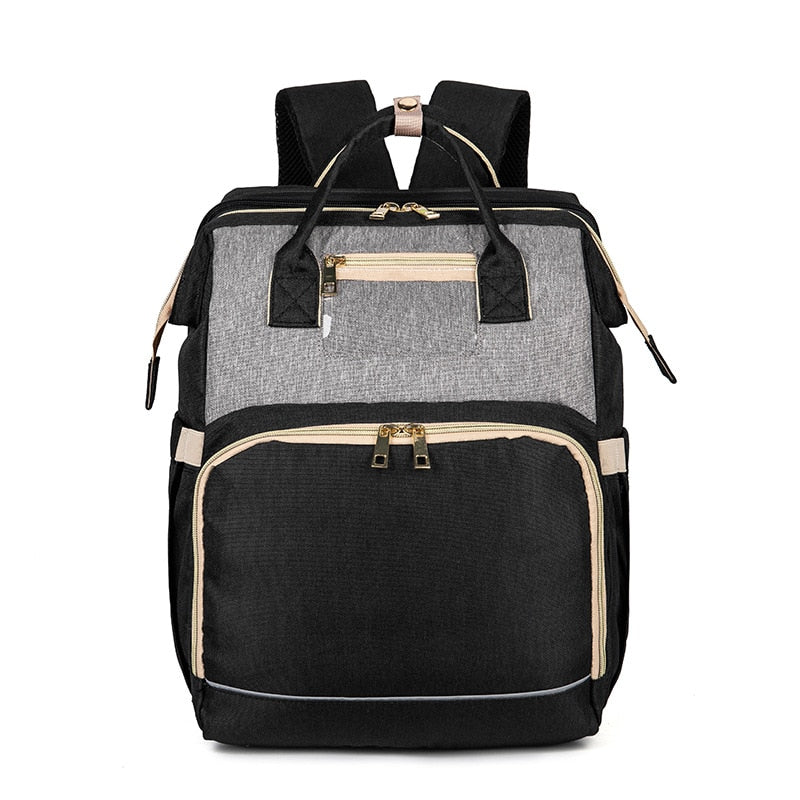 Enhanced Product Title:  
"Convertible Baby Diaper Backpack with Foldable Bassinet | Waterproof Multi-Pocket Design for Ultimate Convenience"  

This title is optimized for clarity and includes relevant keywords that potential customers might search for,