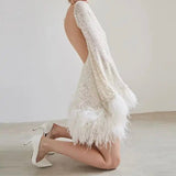 Women's Mini Fitted Dress with Sequin Hem and Feather Details - Elegant Party Wear