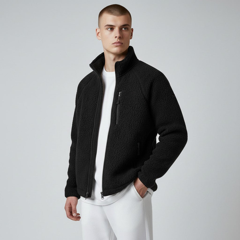 Men's longline coat showing sleeve and cuff