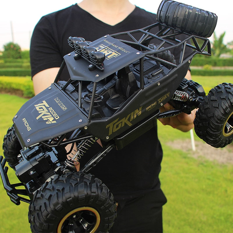 Enhanced Product Title: **1:12 Scale RC Monster Truck 4x4 Off-Road Vehicle - High-Speed Remote Control Toy for All Terrain Adventure**