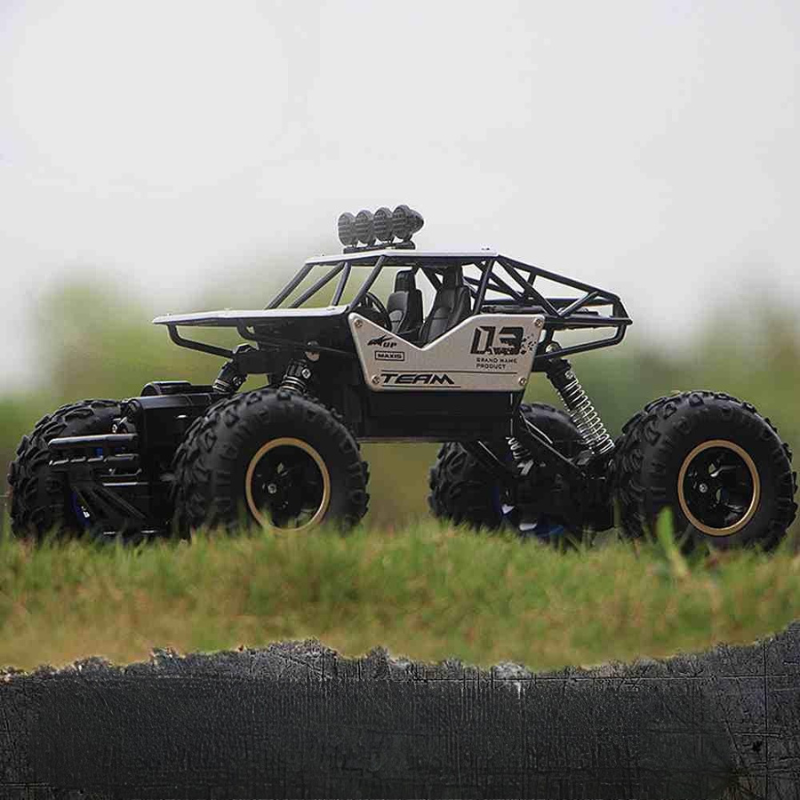 Enhanced Product Title: **1:12 Scale RC Monster Truck 4x4 Off-Road Vehicle - High-Speed Remote Control Toy for All Terrain Adventure**