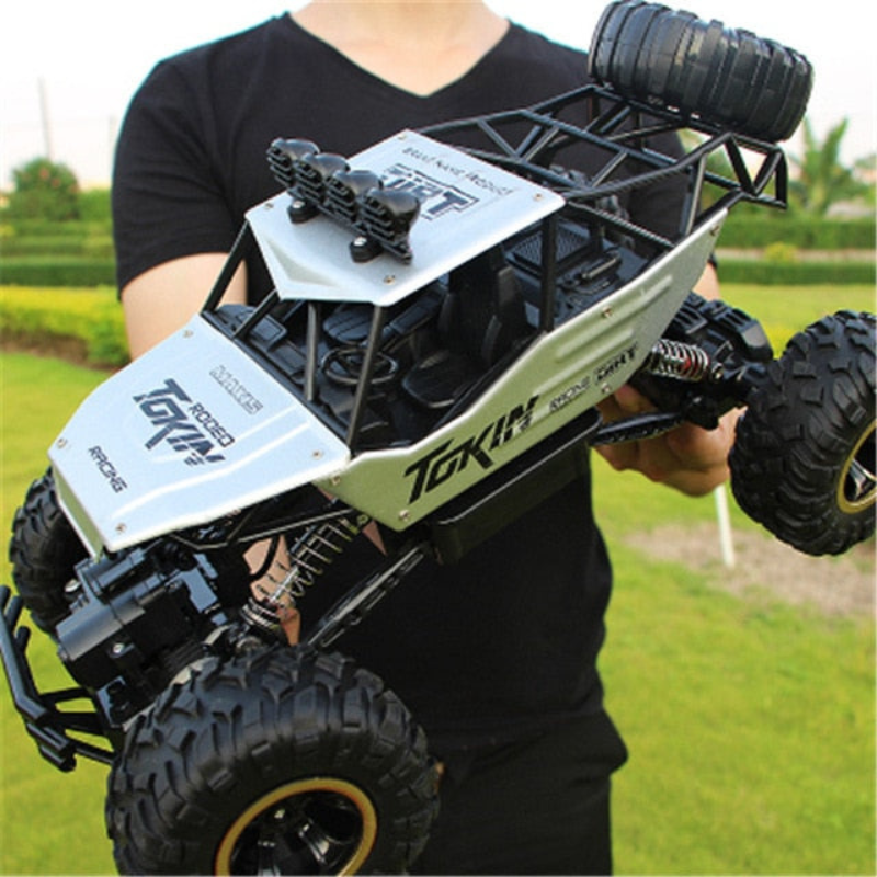 Enhanced Product Title: **1:12 Scale RC Monster Truck 4x4 Off-Road Vehicle - High-Speed Remote Control Toy for All Terrain Adventure**