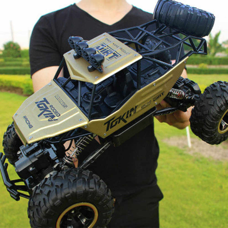 Enhanced Product Title: **1:12 Scale RC Monster Truck 4x4 Off-Road Vehicle - High-Speed Remote Control Toy for All Terrain Adventure**