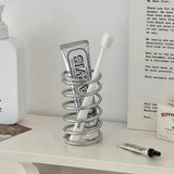 Enhanced Product Title: **Premium Stainless Steel Spiral Toothbrush Holder - Modern Bathroom Organizer for Toothbrushes & Accessories**