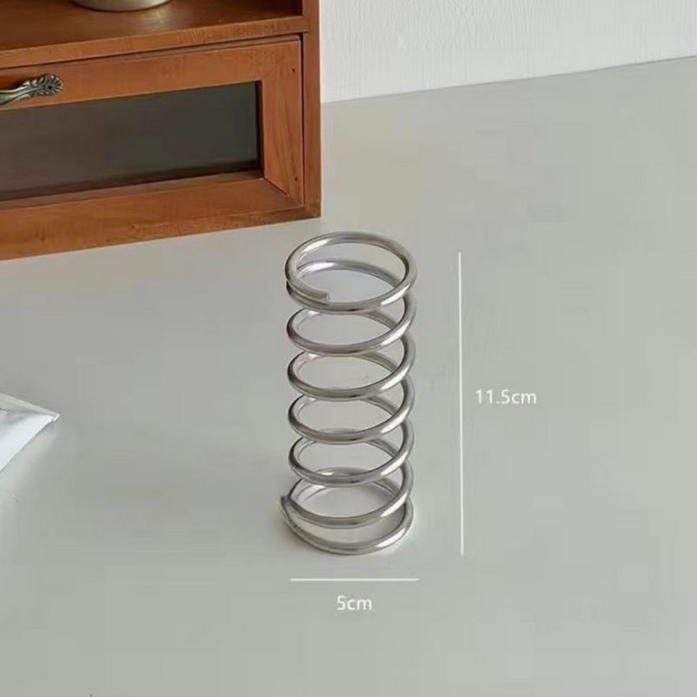 Enhanced Product Title: **Premium Stainless Steel Spiral Toothbrush Holder - Modern Bathroom Organizer for Toothbrushes & Accessories**