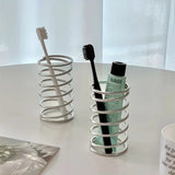Enhanced Product Title: **Premium Stainless Steel Spiral Toothbrush Holder - Modern Bathroom Organizer for Toothbrushes & Accessories**