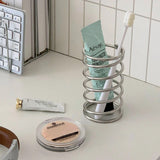 Enhanced Product Title: **Premium Stainless Steel Spiral Toothbrush Holder - Modern Bathroom Organizer for Toothbrushes & Accessories**