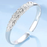 Elegant Sterling Silver Peacock Charm Bracelet - Unique Artisan Jewelry for Women