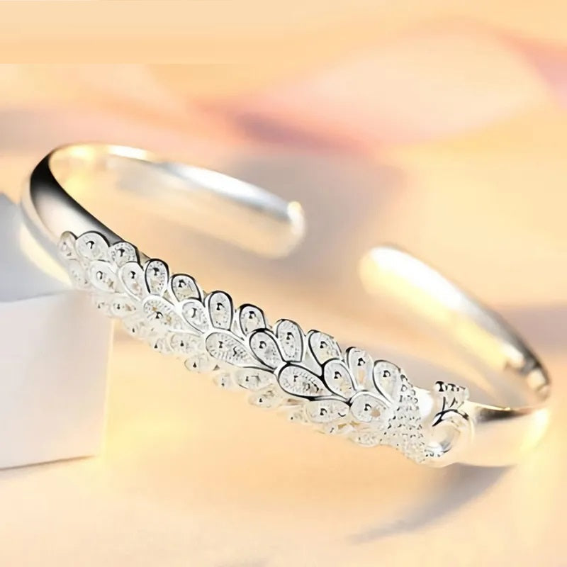 Elegant Sterling Silver Peacock Charm Bracelet - Unique Artisan Jewelry for Women