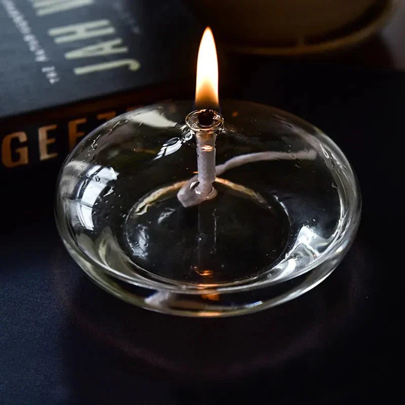 Here’s an enhanced and optimized product title for Google Shopping:

"Elegant Glas-Öllampe – Handgefertigte Glasöl-Lampe für stimmungsvolle Beleuchtung | Ideal für Innen- und Außenbereich"

This title includes keywords that potential customers might searc