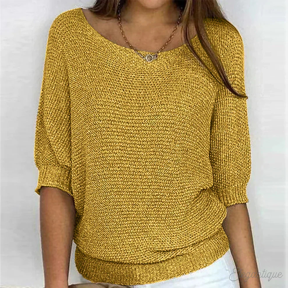 Enhanced Product Title: **Eunice™ Relaxed Knit Top - Cozy & Stylish Women's Sweater** 

This title includes relevant keywords that can help improve visibility in Google Shopping while clearly describing the product.