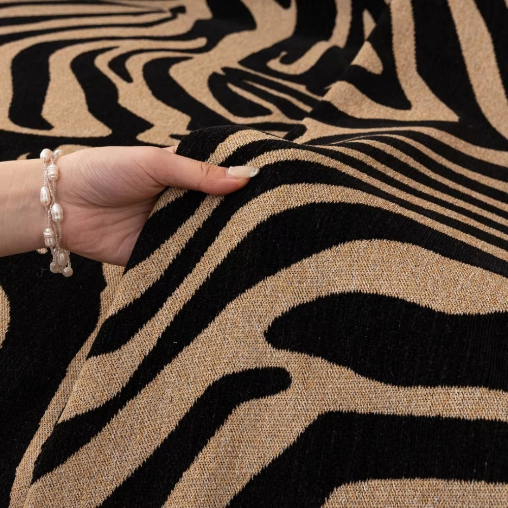 Enhanced Product Title: "Zentara Chenille Zebra Print Geometric Sofa Cover - Stylish & Durable Furniture Protector" 

This title includes relevant keywords while highlighting the product's features, making it more appealing for Google Shopping.